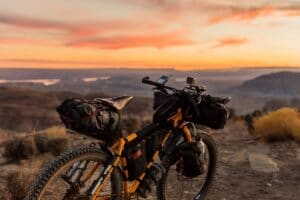 mountain biking gear and sunset